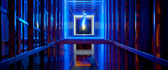 A picture containing fence, indoor
Description automatically generated