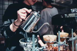 Photo of barista making a coffee