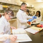 high school students doing summer research in lab