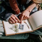 student looking at small details