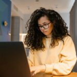 student writing introduction for college essay