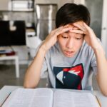student thinking on grammar for college essays