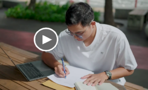 student writing essay