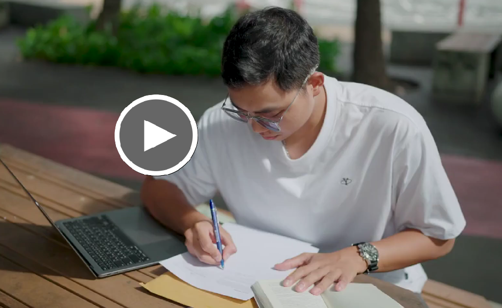 student writing essay