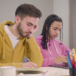 student editing essays for cliches
