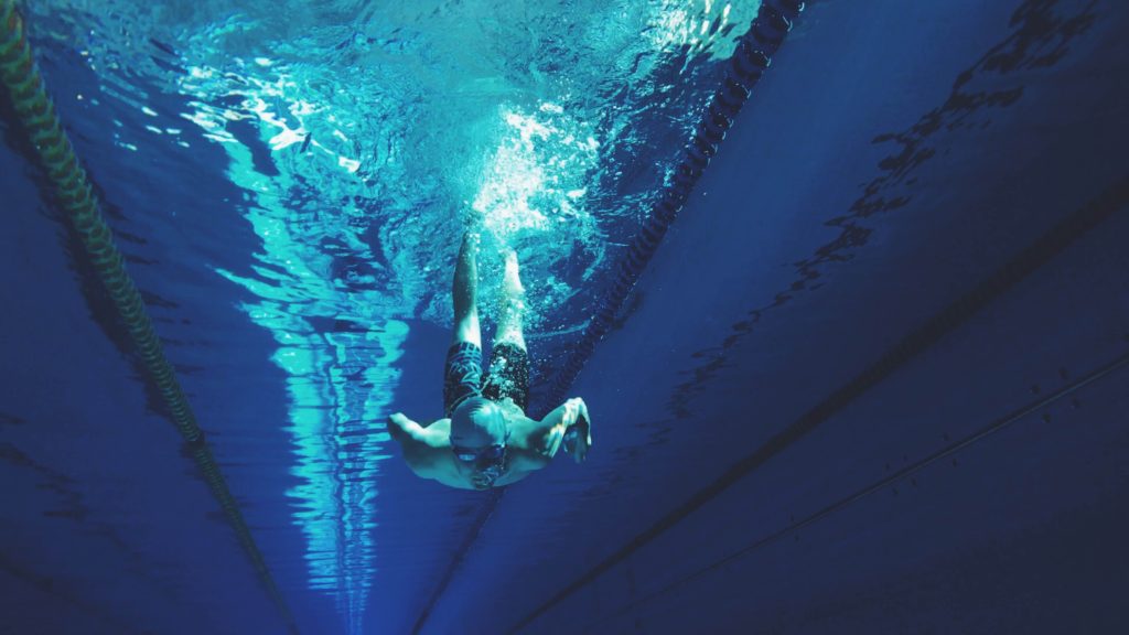 man swimming underwater