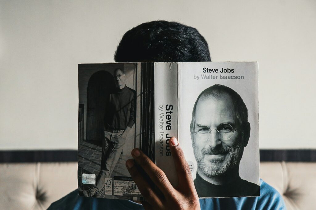 student reading business book