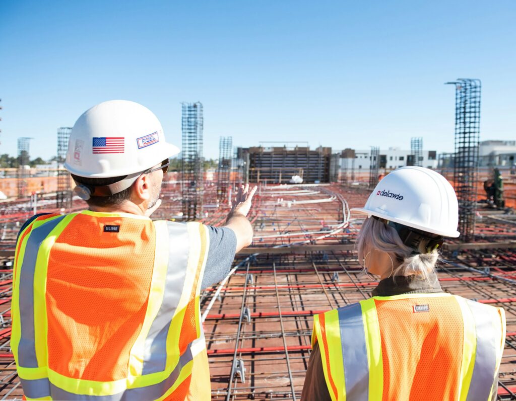 two engineers looking at engineering project